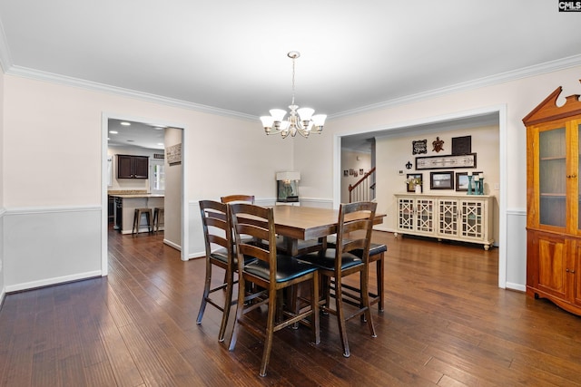 dining space featuring crown molding, a chandelier, dark wood finished floors, stairs, and baseboards