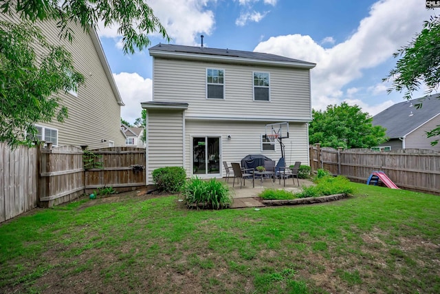 back of house featuring a patio area