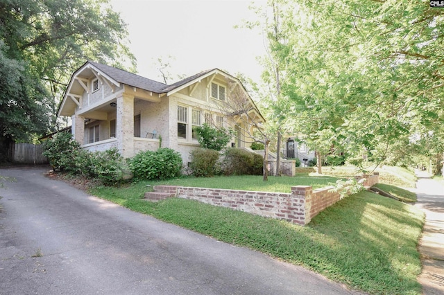 view of home's exterior with brick siding