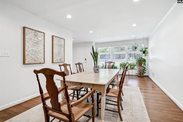 1148 Eastminster Dr, Columbia, SC 29204 - dining space featuring light wood finished floors, recessed lighting, baseboards, and ornamental molding
