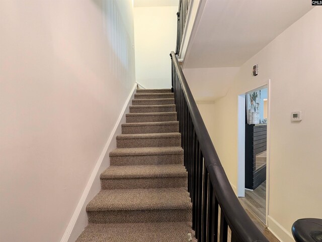 staircase with baseboards
