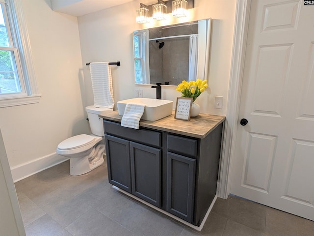 full bathroom with tile patterned floors, baseboards, a tile shower, and toilet