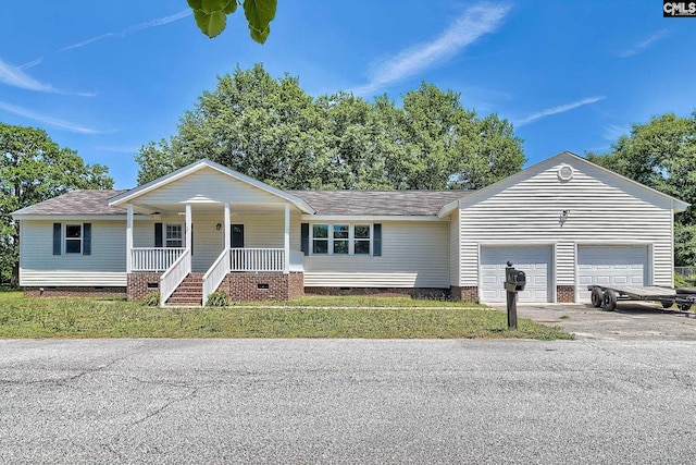 single story home with crawl space, a porch, roof with shingles, a garage, and driveway