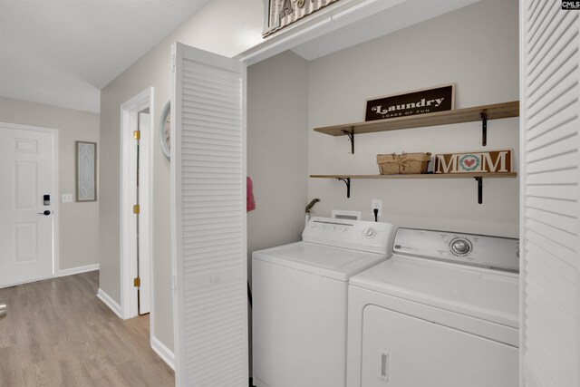 117 Rosewood Ln, Lexington, SC 29072 - washroom featuring independent washer and dryer, light wood-type flooring, and baseboards