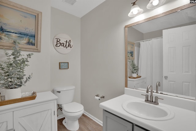 117 Rosewood Ln, Lexington, SC 29072 - full bathroom with toilet, wood finished floors, baseboards, vanity, and curtained shower