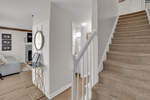 117 Rosewood Ln, Lexington, SC 29072 - stairway with wood finished floors, baseboards, and a fireplace