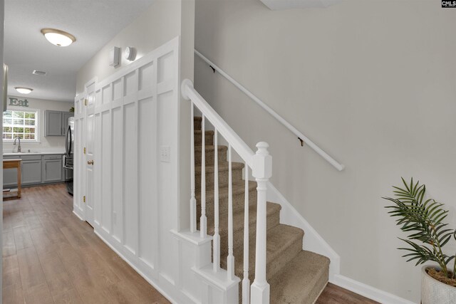 117 Rosewood Ln, Lexington, SC 29072 - staircase featuring wood finished floors