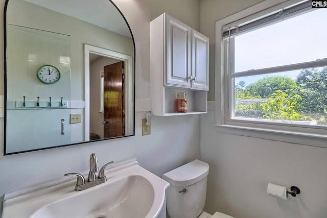 bathroom featuring a sink and toilet