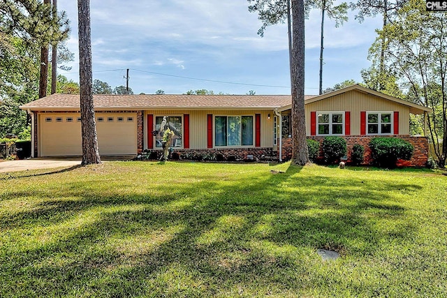 ranch-style house featuring an attached garage, driveway, a front yard, and brick siding