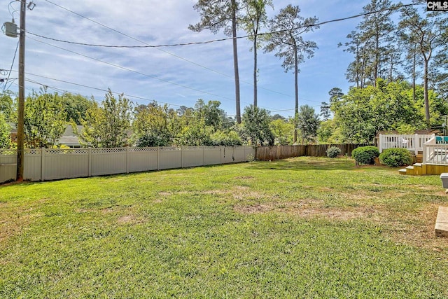 view of yard featuring a deck