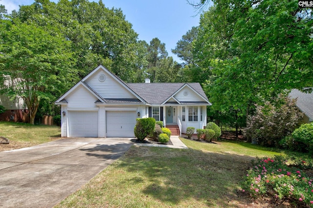 ranch-style home featuring concrete driveway, an attached garage, a front yard, roof with shingles, and covered porch