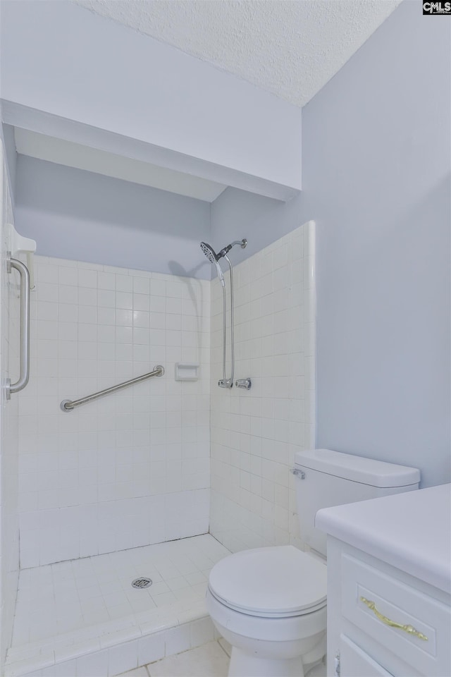 full bath with toilet, a stall shower, and a textured ceiling
