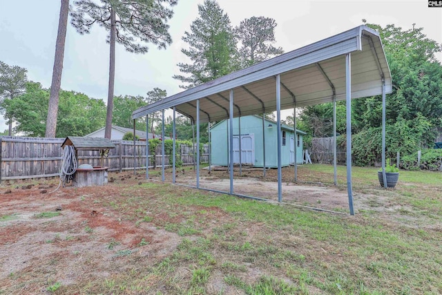 view of yard with a shed, an outbuilding, and a detached carport