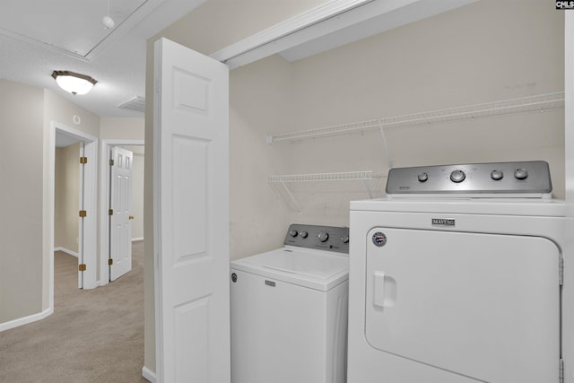 103 Beacon Ln, Columbia, SC 29229 - washroom featuring washing machine and dryer, light carpet, baseboards, and attic access
