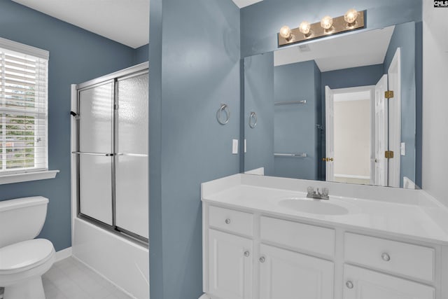 103 Beacon Ln, Columbia, SC 29229 - full bath featuring toilet, vanity, bath / shower combo with glass door, and baseboards
