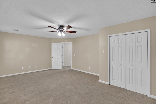 103 Beacon Ln, Columbia, SC 29229 - unfurnished bedroom with a textured ceiling, carpet floors, ceiling fan, and baseboards