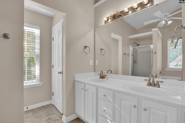 103 Beacon Ln, Columbia, SC 29229 - full bathroom featuring ceiling fan, a shower stall, double vanity, baseboards, and lofted ceiling