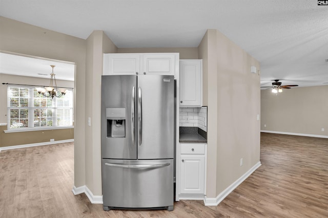 103 Beacon Ln, Columbia, SC 29229 - kitchen featuring stainless steel fridge with ice dispenser, light wood-style flooring, and white cabinets