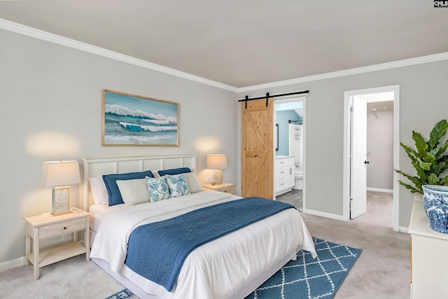 284 Outrigger Ln, Columbia, SC 29212 - bedroom with a barn door, ornamental molding, carpet flooring, baseboards, and a spacious closet