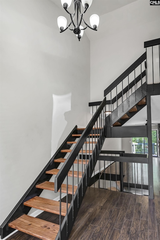 284 Outrigger Ln, Columbia, SC 29212 - staircase featuring wood finished floors and a chandelier