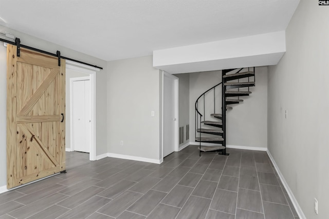 284 Outrigger Ln, Columbia, SC 29212 - basement featuring baseboards, a barn door, stairs, and wood tiled floors
