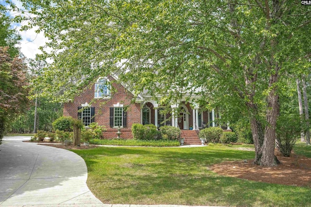 17 Laurel Bluff Ct, Columbia, SC 29229 - view of property hidden behind natural elements featuring brick siding and a front yard