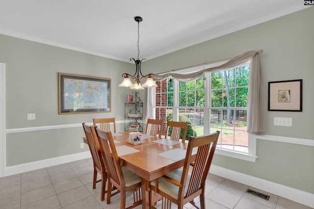 17 Laurel Bluff Ct, Columbia, SC 29229 - dining space featuring ornamental molding, baseboards, light tile patterned floors, and a chandelier