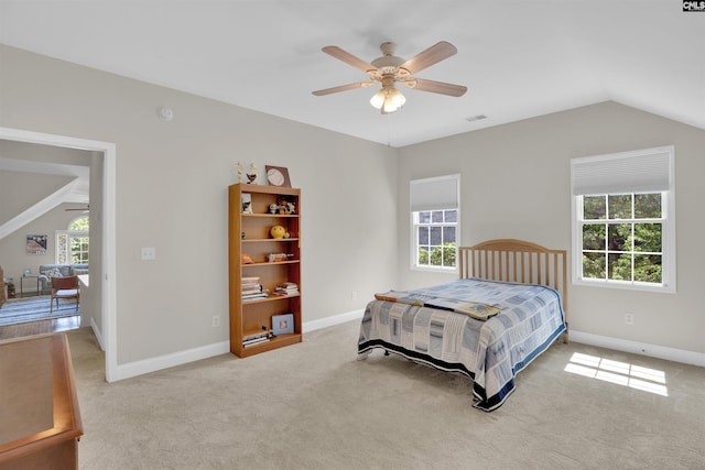 17 Laurel Bluff Ct, Columbia, SC 29229 - bedroom with vaulted ceiling, multiple windows, light colored carpet, ceiling fan, and baseboards