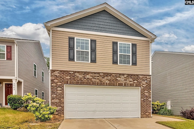 2040 Elmridge Rd, Columbia, SC 29209 - view of front of home with brick siding, driveway, and a garage