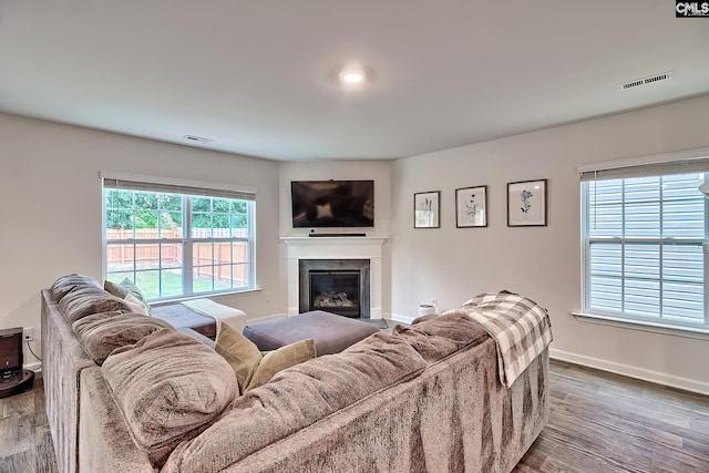 2040 Elmridge Rd, Columbia, SC 29209 - living room with wood finished floors, a glass covered fireplace, and baseboards