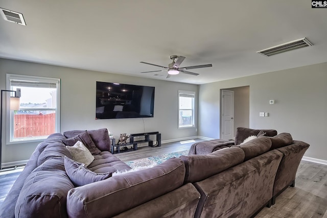 171 Turnfield Dr, West Columbia, SC 29170 - living room with wood finished floors, a ceiling fan, and baseboards