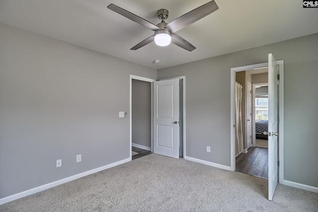 171 Turnfield Dr, West Columbia, SC 29170 - unfurnished bedroom with baseboards, carpet floors, and a ceiling fan
