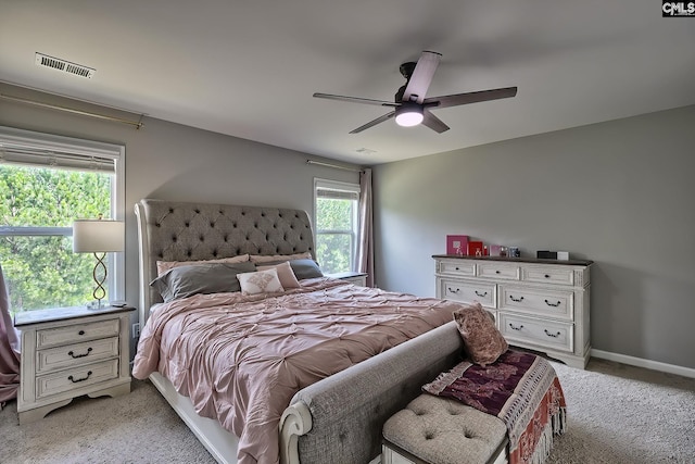 171 Turnfield Dr, West Columbia, SC 29170 - bedroom featuring multiple windows, light carpet, and a ceiling fan
