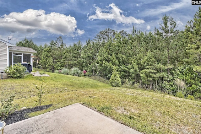 171 Turnfield Dr, West Columbia, SC 29170 - view of grassy yard with a patio area and a sunroom