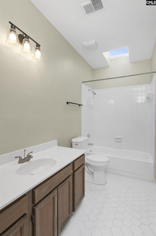 112 Gateway Ln, Columbia, SC 29210 - full bathroom featuring toilet, vanity, bathing tub / shower combination, and a skylight