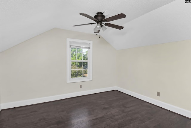 112 Gateway Ln, Columbia, SC 29210 - additional living space with ceiling fan, dark wood-type flooring, vaulted ceiling, and baseboards