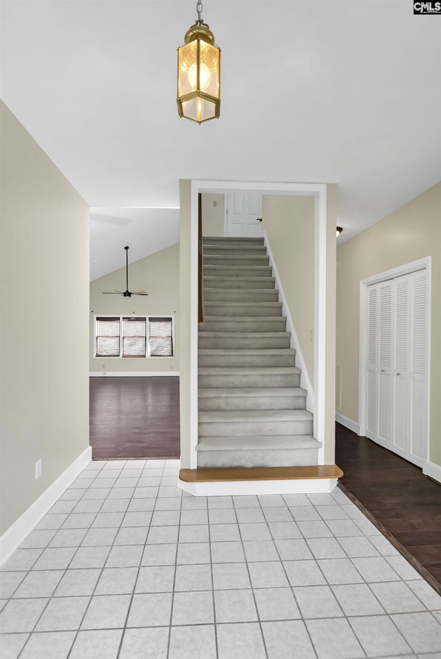 112 Gateway Ln, Columbia, SC 29210 - stairs with baseboards, wood finished floors, lofted ceiling, and a ceiling fan