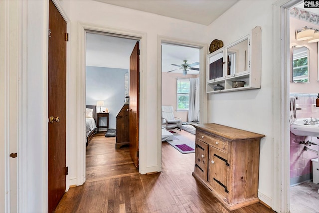 1217 Jensen St, West Columbia, SC 29169 - hallway featuring dark wood finished floors and a sink