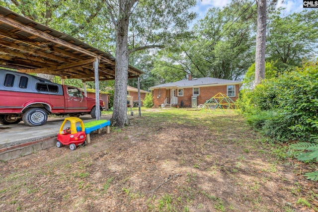 1217 Jensen St, West Columbia, SC 29169 - view of yard with a carport