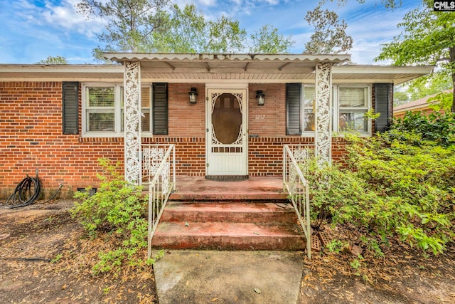 1217 Jensen St, West Columbia, SC 29169 - view of front facade with brick siding and covered porch