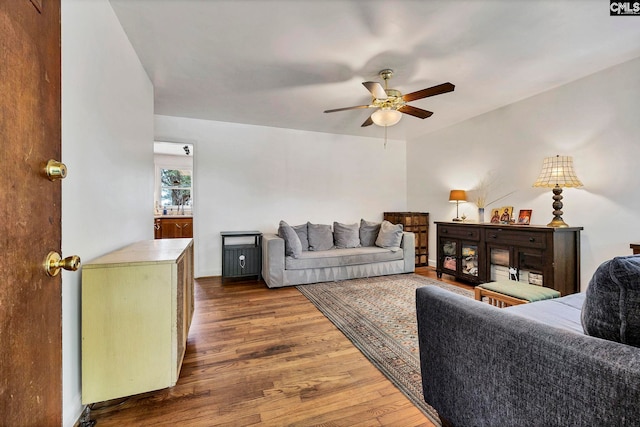 1217 Jensen St, West Columbia, SC 29169 - living area with ceiling fan, wood finished floors, and baseboards