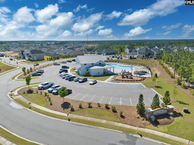 aerial perspective of suburban area with a pool area