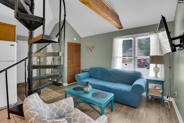 living room with baseboards and wood finished floors