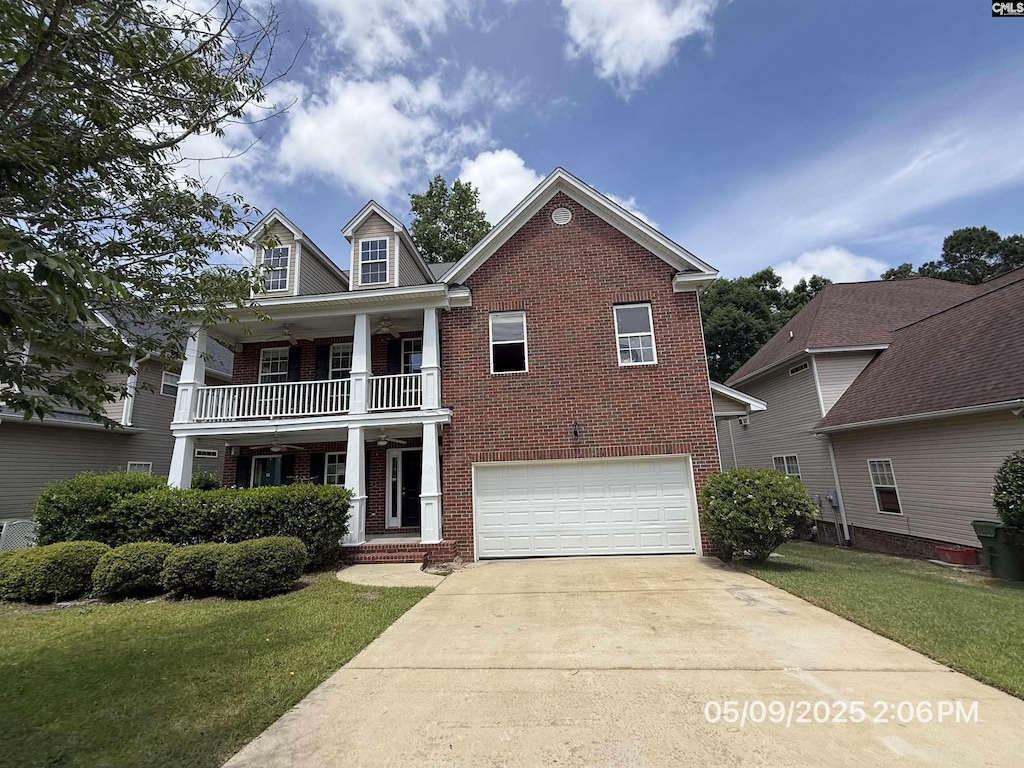 153 Berkeley Ridge Dr, Columbia, SC 29229 - view of front of house with brick siding, a balcony, a garage, driveway, and a front lawn