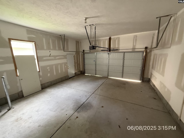 153 Berkeley Ridge Dr, Columbia, SC 29229 - garage featuring a garage door opener and baseboards