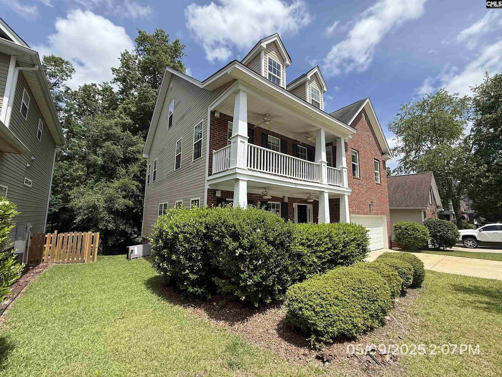 153 Berkeley Ridge Dr, Columbia, SC 29229 - view of front of property with a balcony, a ceiling fan, brick siding, and concrete driveway
