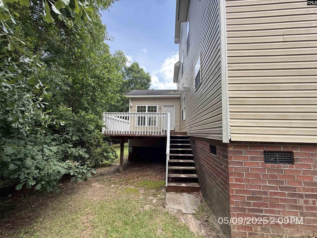 153 Berkeley Ridge Dr, Columbia, SC 29229 - view of side of home with a deck, crawl space, and stairs