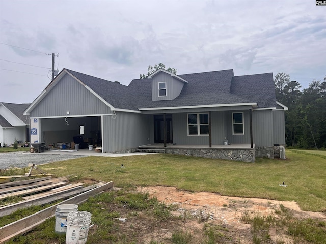 281 Osprey Pointe Ln, Prosperity, SC 29127 - view of front of property featuring a garage, gravel driveway, a shingled roof, and covered porch