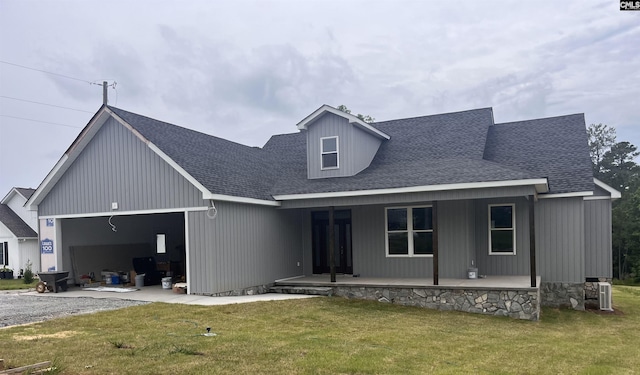281 Osprey Pointe Ln, Prosperity, SC 29127 - view of front of property featuring a garage, a shingled roof, a front lawn, and a porch