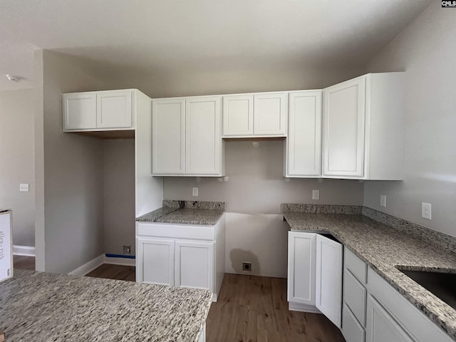 281 Osprey Pointe Ln, Prosperity, SC 29127 - kitchen featuring white cabinetry, dark wood-type flooring, a sink, and baseboards